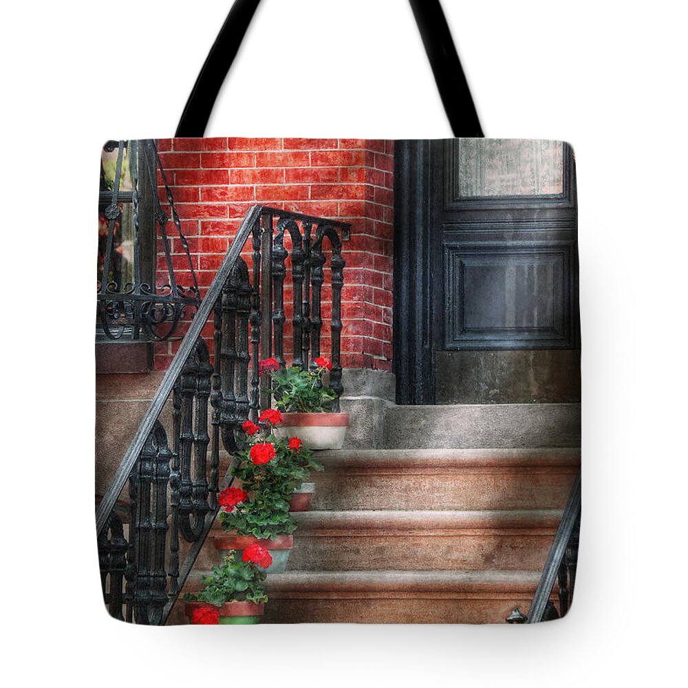Hoboken Tote Bag featuring the photograph Spring - Porch - Hoboken NJ - Geraniums on stairs by Mike Savad
