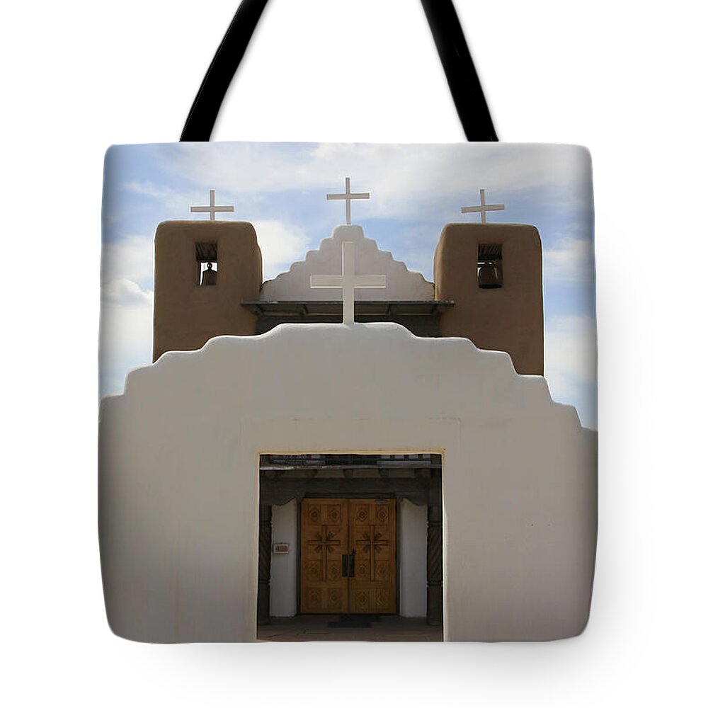 Taos Pueblo Tote Bag featuring the photograph St. Jerome Chapel - Taos Pueblo by Mike McGlothlen