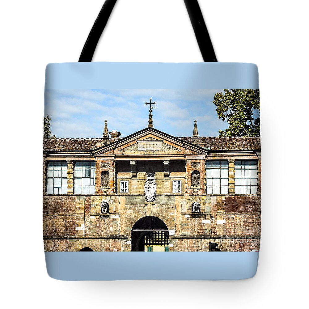 St Peters Tote Bag featuring the photograph St Peters Gate of Lucca by Prints of Italy