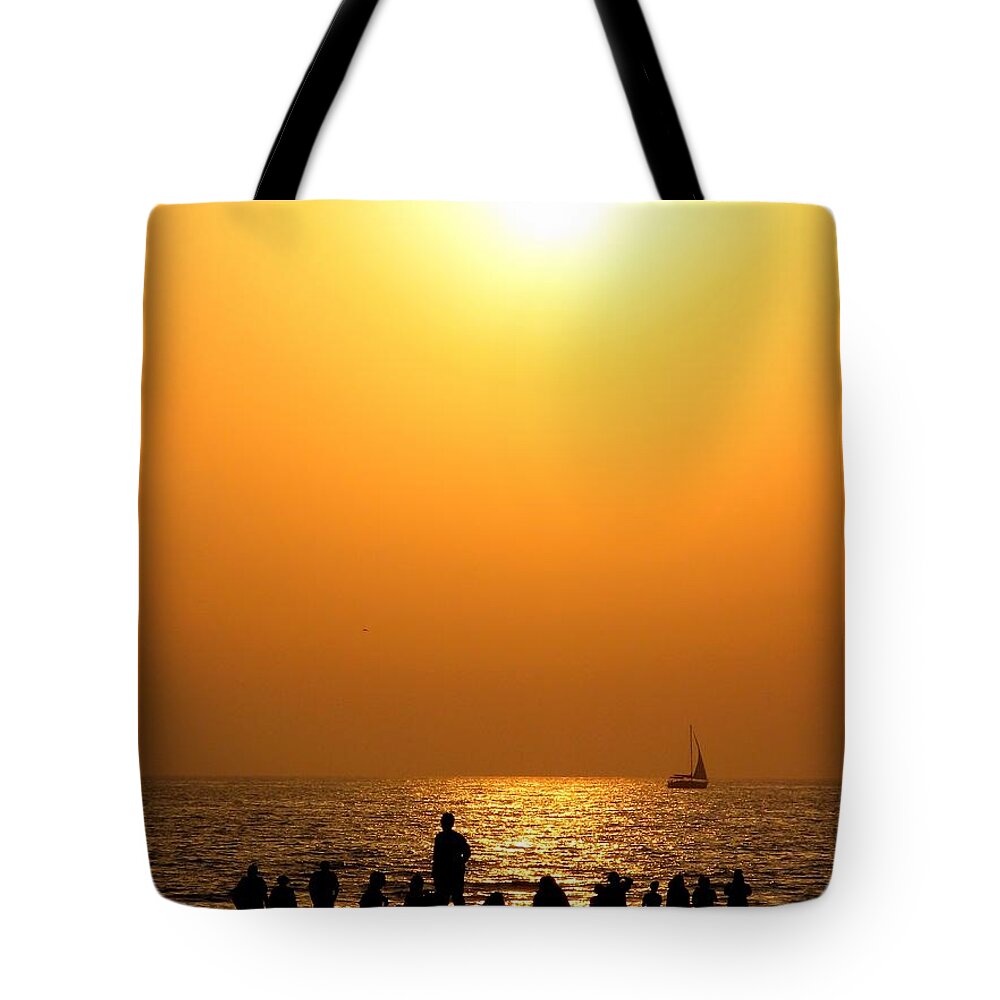 Sunset Tote Bag featuring the photograph St. Petersburg sunset by Peggy Hughes