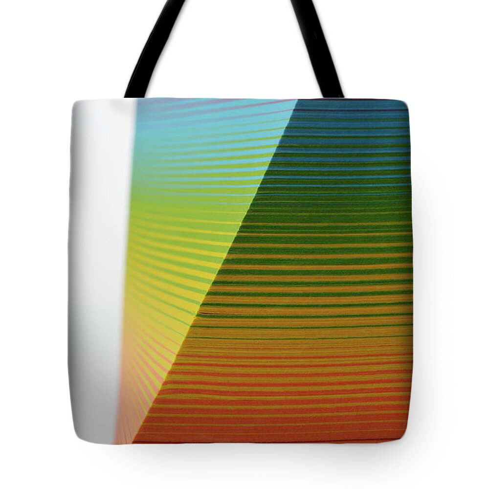 White Background Tote Bag featuring the photograph Stack Of Colorful Paper by Yagi Studio