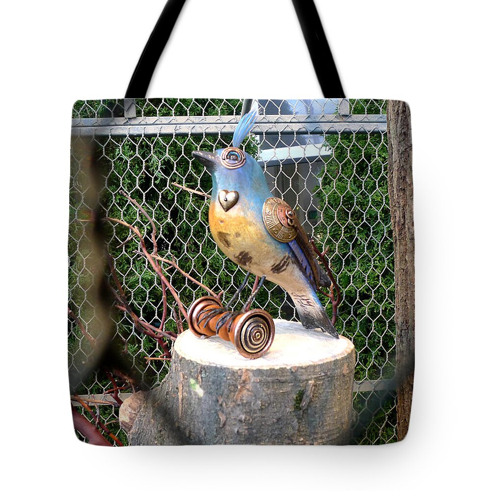 Richard Reeve Tote Bag featuring the photograph Steampunk Blue Tufted Brass Heart Bird by Richard Reeve