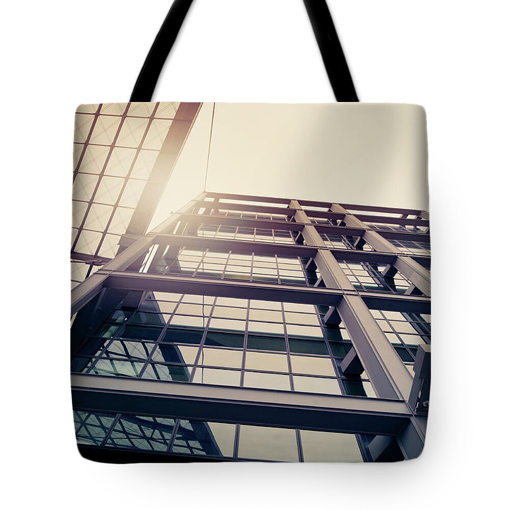 Orange Color Tote Bag featuring the photograph Steel And Glass Building by Ppampicture