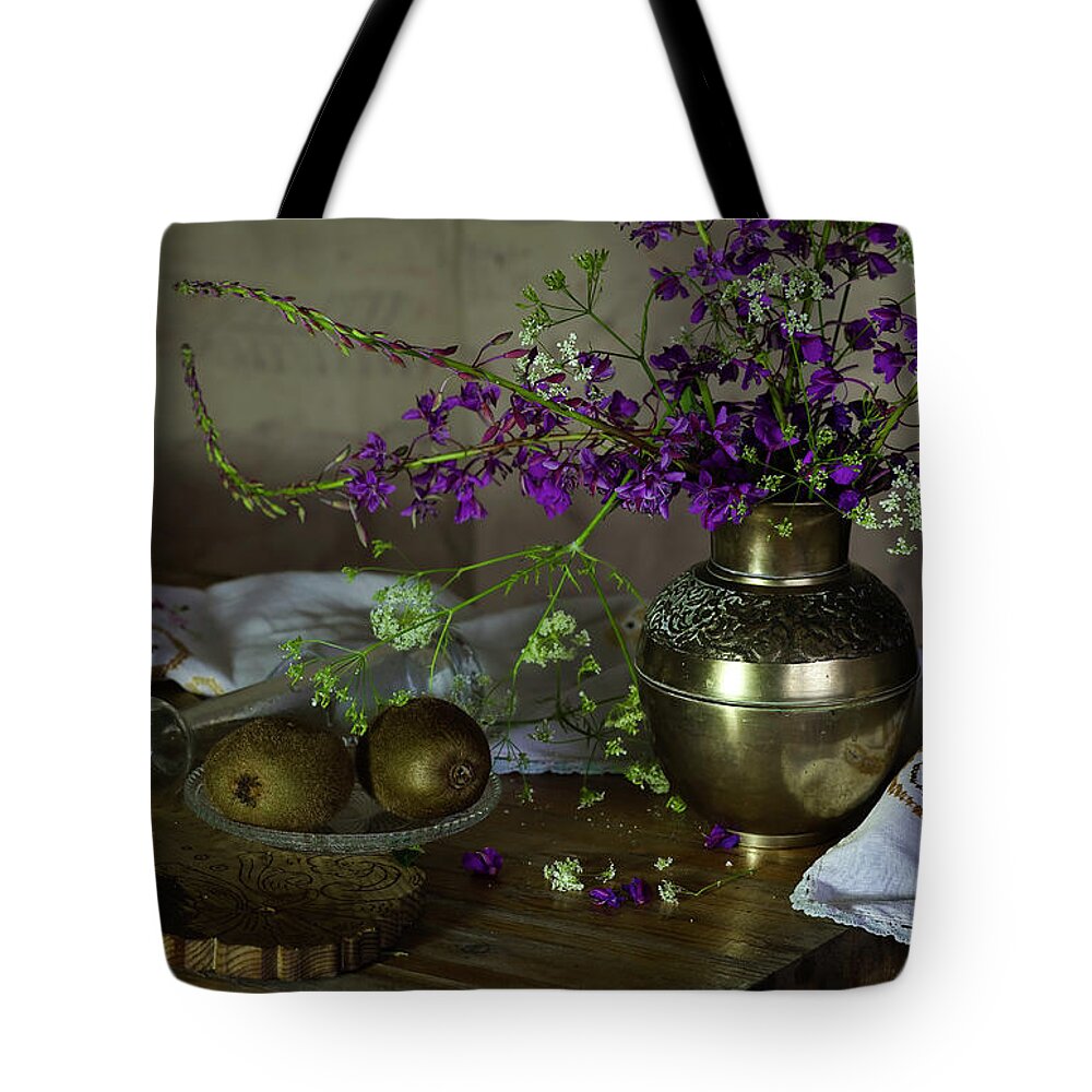 Laboratory Glassware Tote Bag featuring the photograph Still Life With Kiwi And Field Flower by Property Of Olga Ressem.
