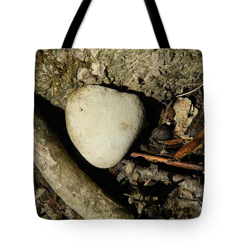 Rock Tote Bag featuring the photograph Stone Heart by Kathy Barney