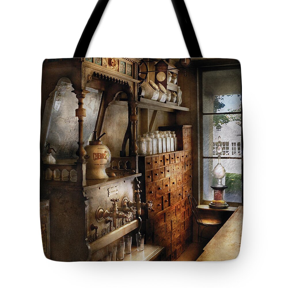 Savad Tote Bag featuring the photograph Store - Turn of the century soda fountain by Mike Savad