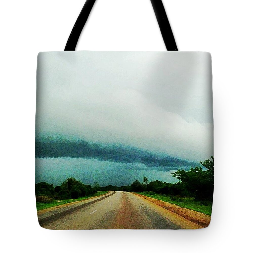Morogoro Tote Bag featuring the photograph Storm on the Horizon by Zinvolle Art