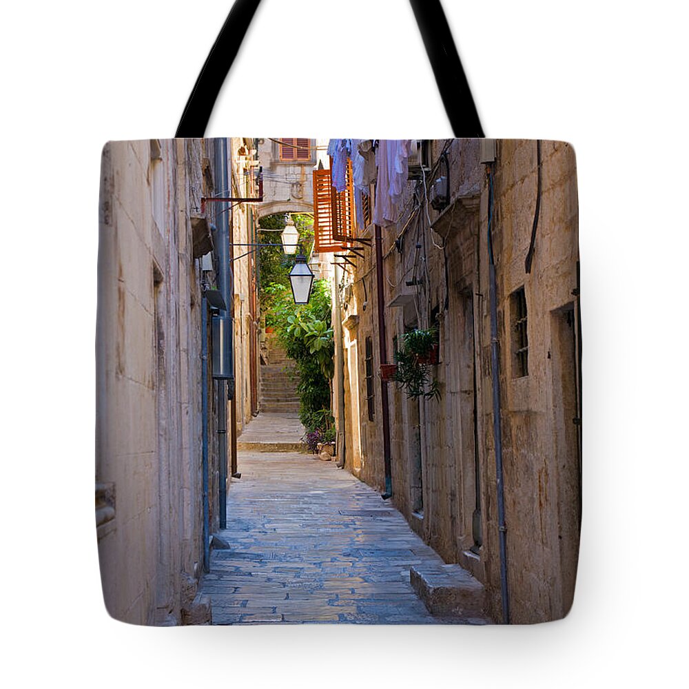 Narrow Tote Bag featuring the photograph Street in Dubrovnik by Alexey Stiop