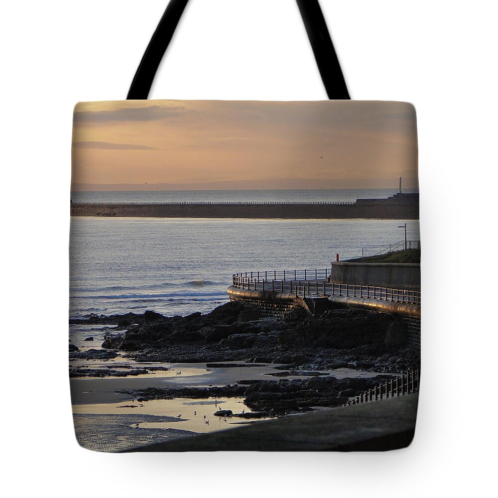 Sunrise On Roker Lighthouse In Sunderland Tote Bag featuring the photograph Sunderland Sunrise by Julia Wilcox