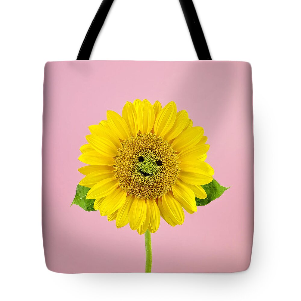 Yellow Tote Bag featuring the photograph Sunflower Smiley Face by Juj Winn