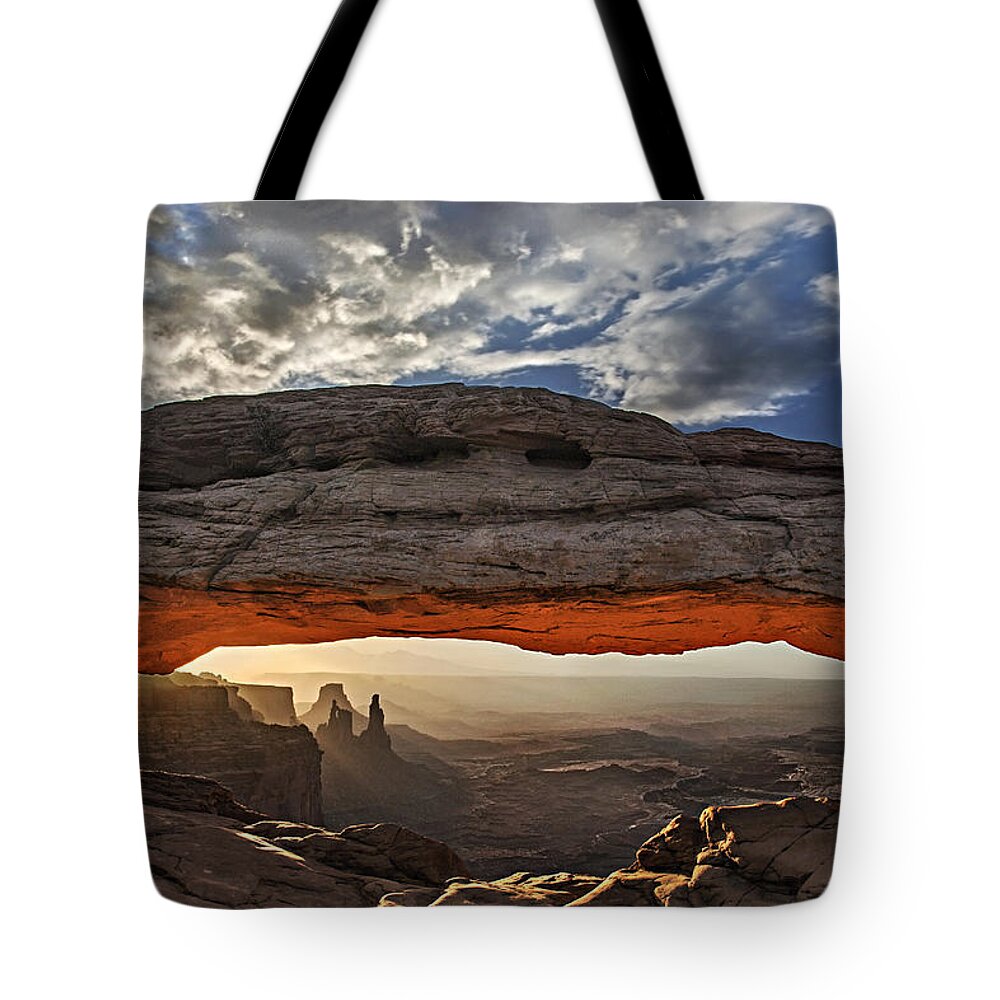 Mesa Arch Tote Bag featuring the photograph Sunrise at Mesa Arch by Roman Kurywczak