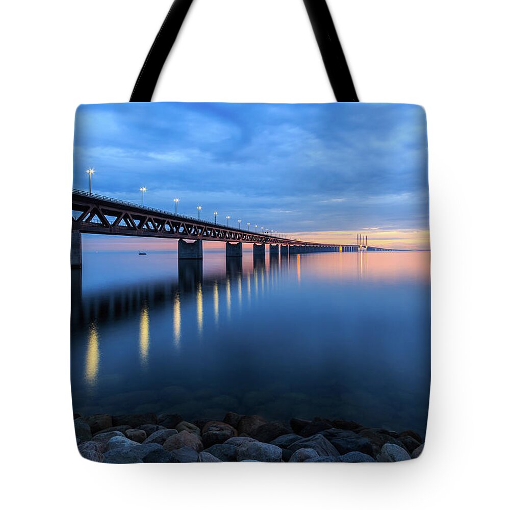 Tranquility Tote Bag featuring the photograph Sunset At The Øresund Bridge, Malmö by Maria Swärd