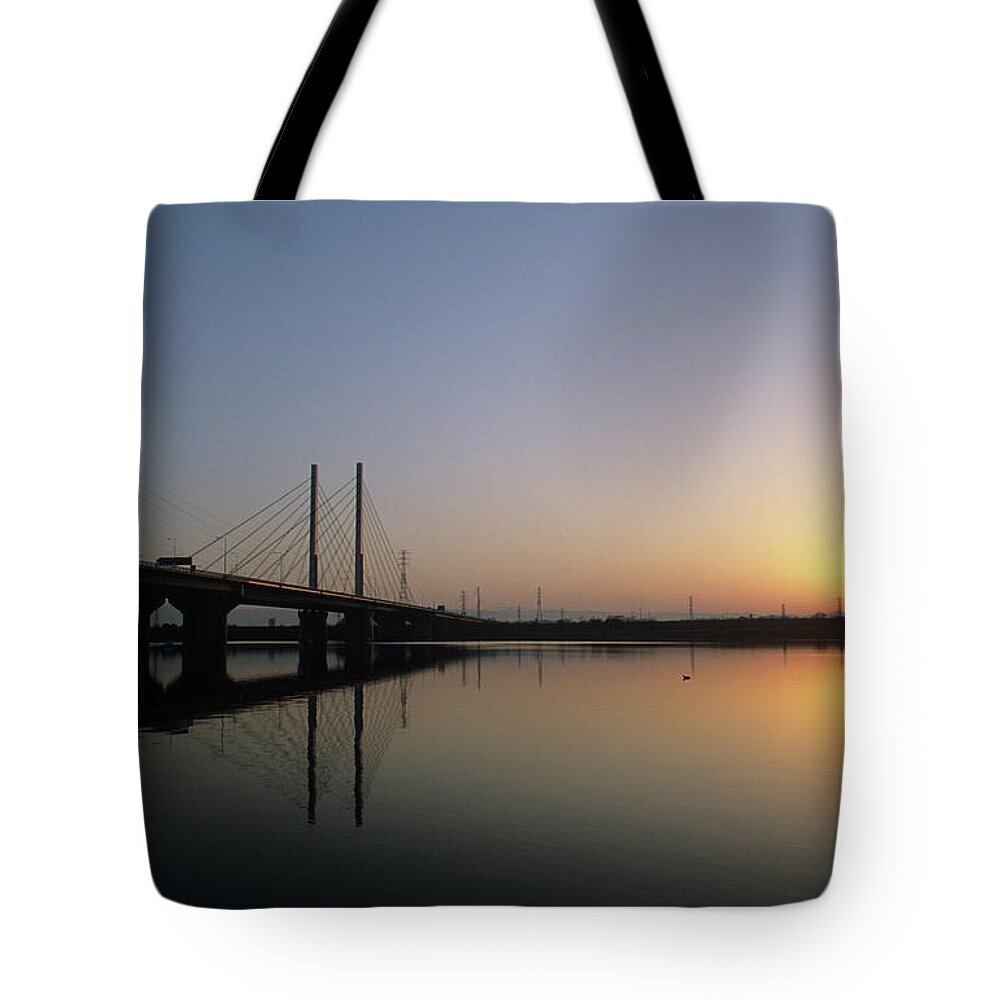 Tranquility Tote Bag featuring the photograph Sunset Of Lake And Cable-stayed Bridge by Huzu1959