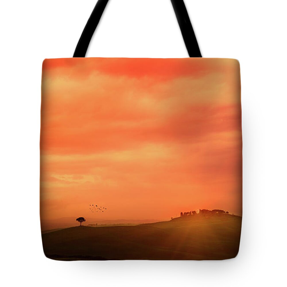 Orange Color Tote Bag featuring the photograph Sunset Over The Tuscan Hills by Deimagine