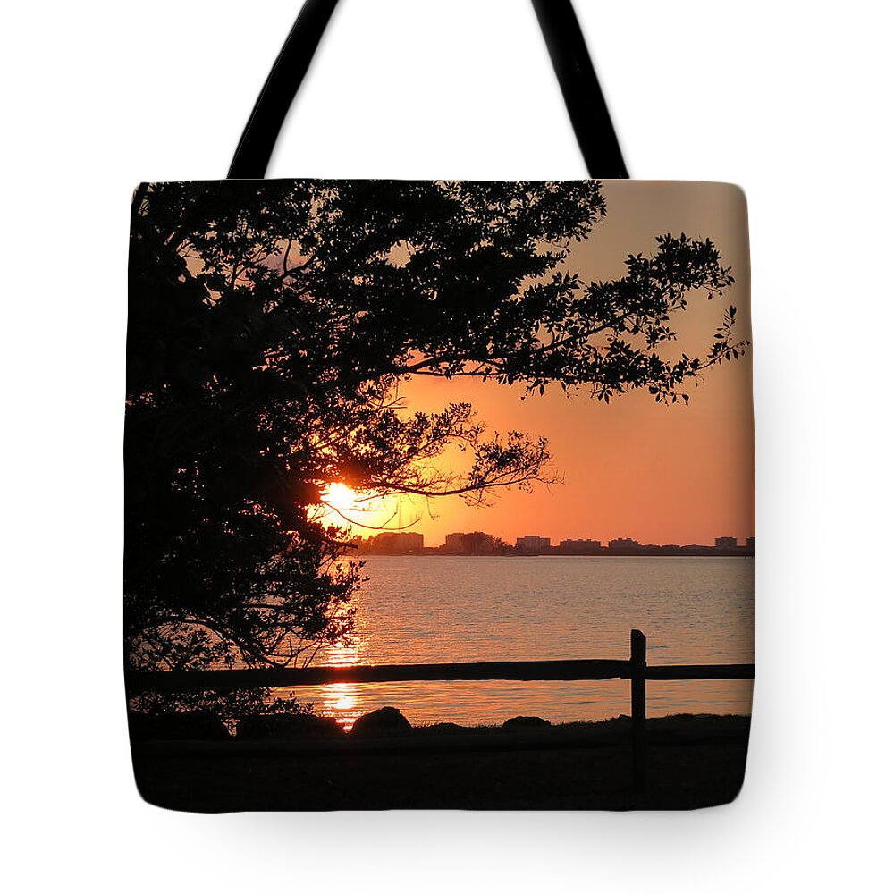 Sunset Tote Bag featuring the photograph Sunset on Sarasota Harbor by Richard Goldman