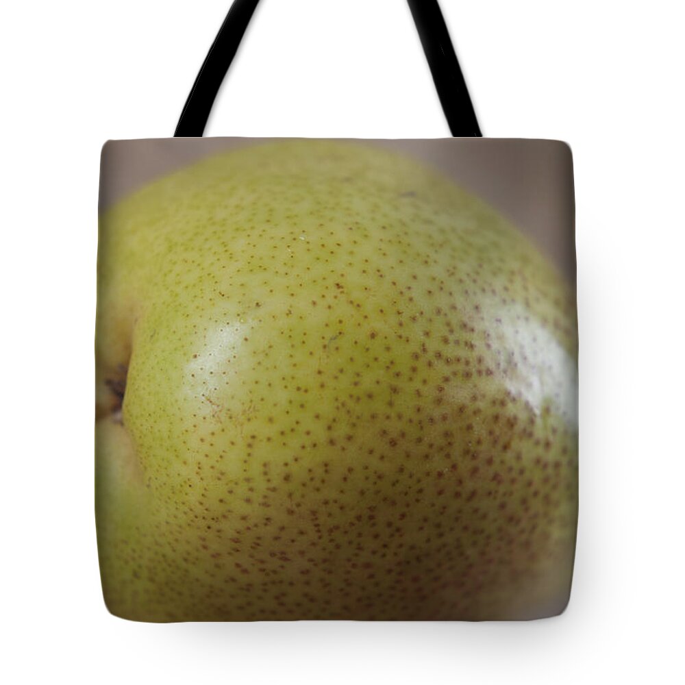 Spots Tote Bag featuring the photograph Sweet Pear by Miguel Winterpacht