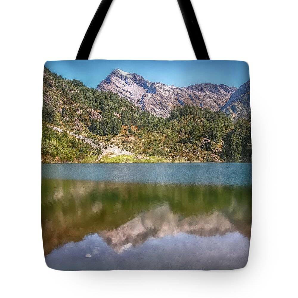 Switzerland Tote Bag featuring the photograph Swiss Tarn by Hanny Heim