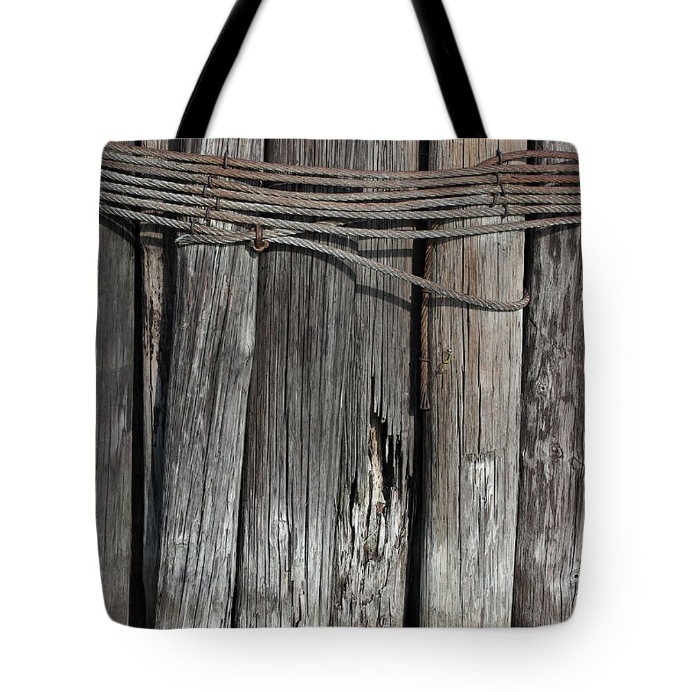 Pilings Tote Bag featuring the photograph Tall Pilings 2 by Mary Bedy