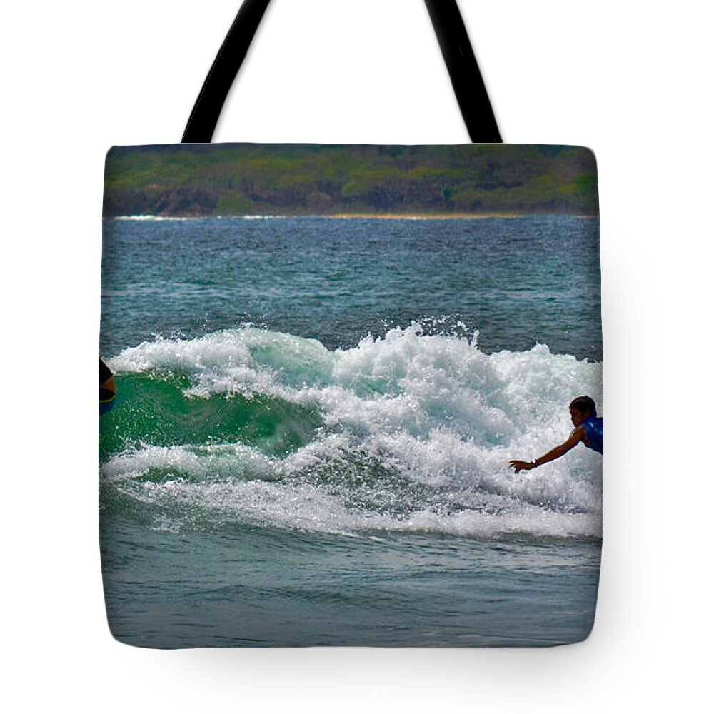 Surfing Tote Bag featuring the photograph Tamarindo Surfing by Gary Keesler