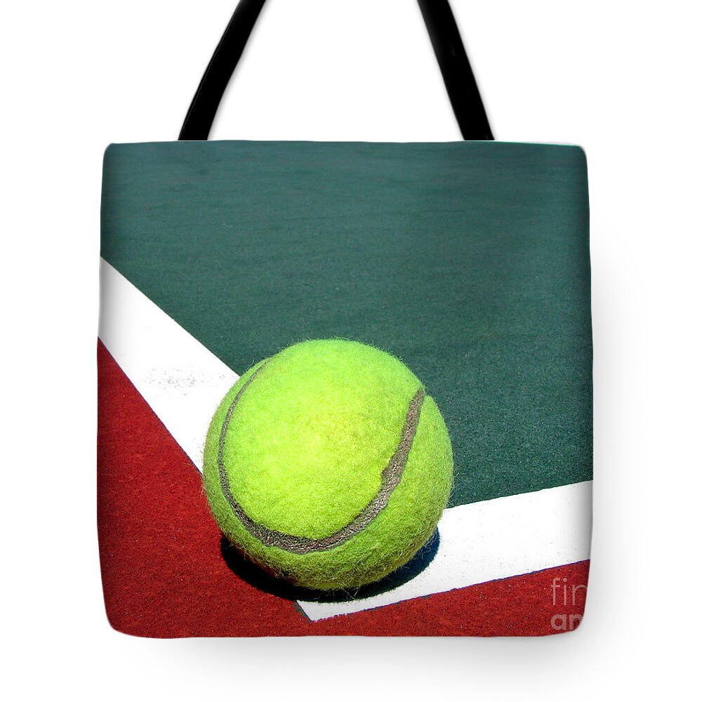 Tennis Tote Bag featuring the photograph Tennis Ball on Court by Olivier Le Queinec
