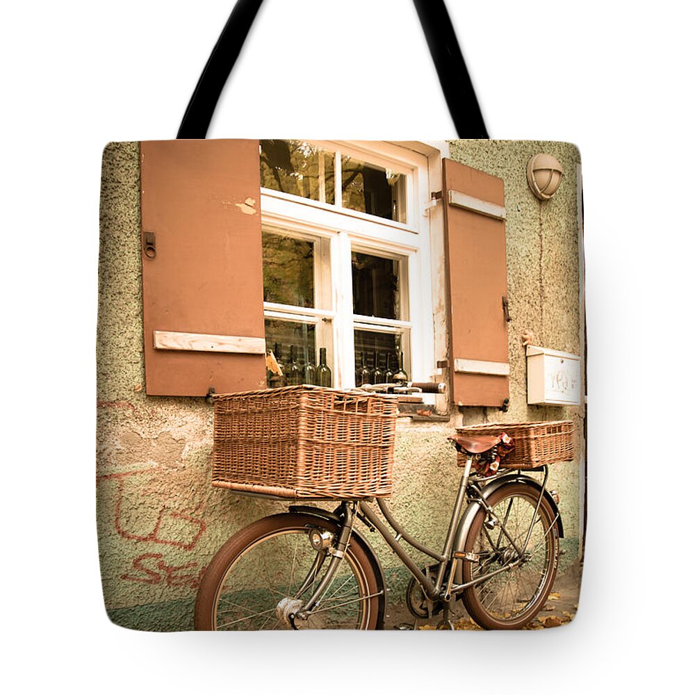 Autumn Tote Bag featuring the photograph The Bicycle by Hannes Cmarits