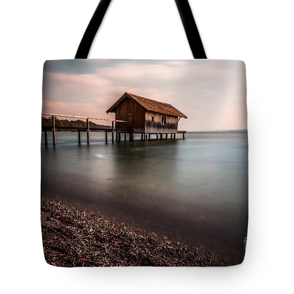 Ammersee Tote Bag featuring the photograph The boats house by Hannes Cmarits