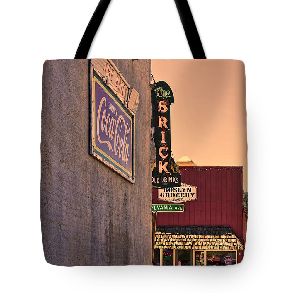 Pub Sign Tote Bag featuring the photograph The Brick at Sunset by Cathy Anderson