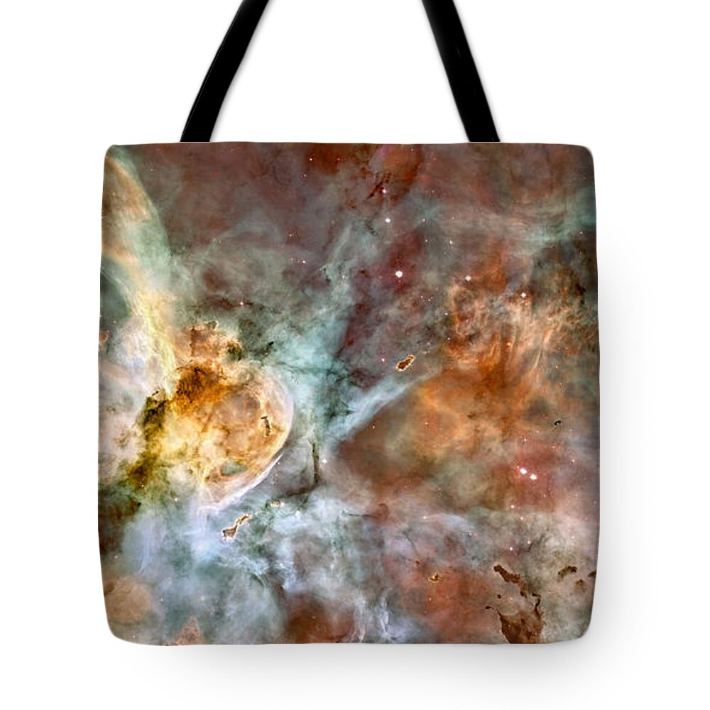 Hubble Tote Bag featuring the photograph The Carina Nebula #1 by Eric Glaser