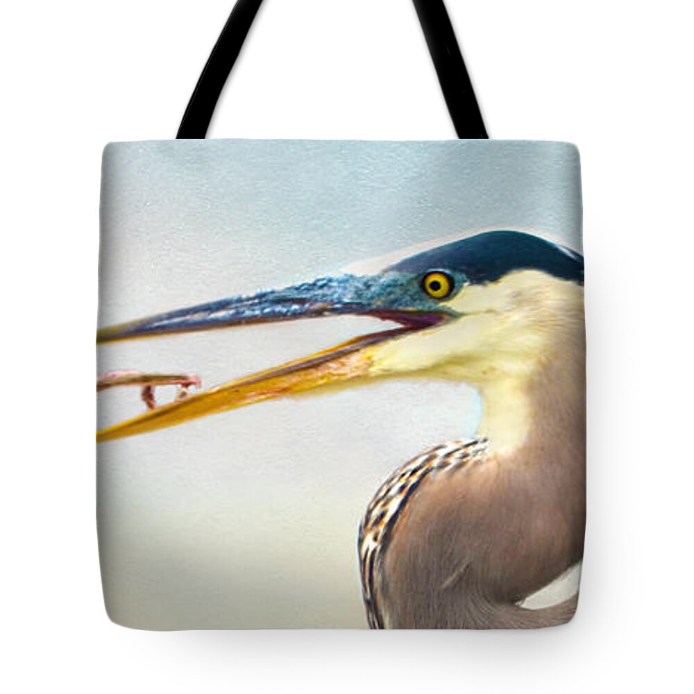 Great Blue Heron Tote Bag featuring the photograph The Catch by Sandi OReilly
