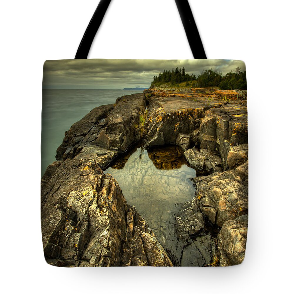 Bay Tote Bag featuring the photograph The Edge by Jakub Sisak