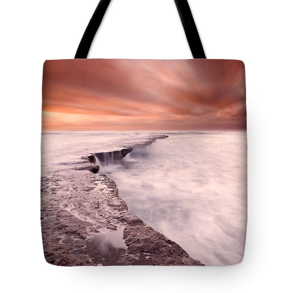 Beach Tote Bag featuring the photograph The edge of earth by Jorge Maia