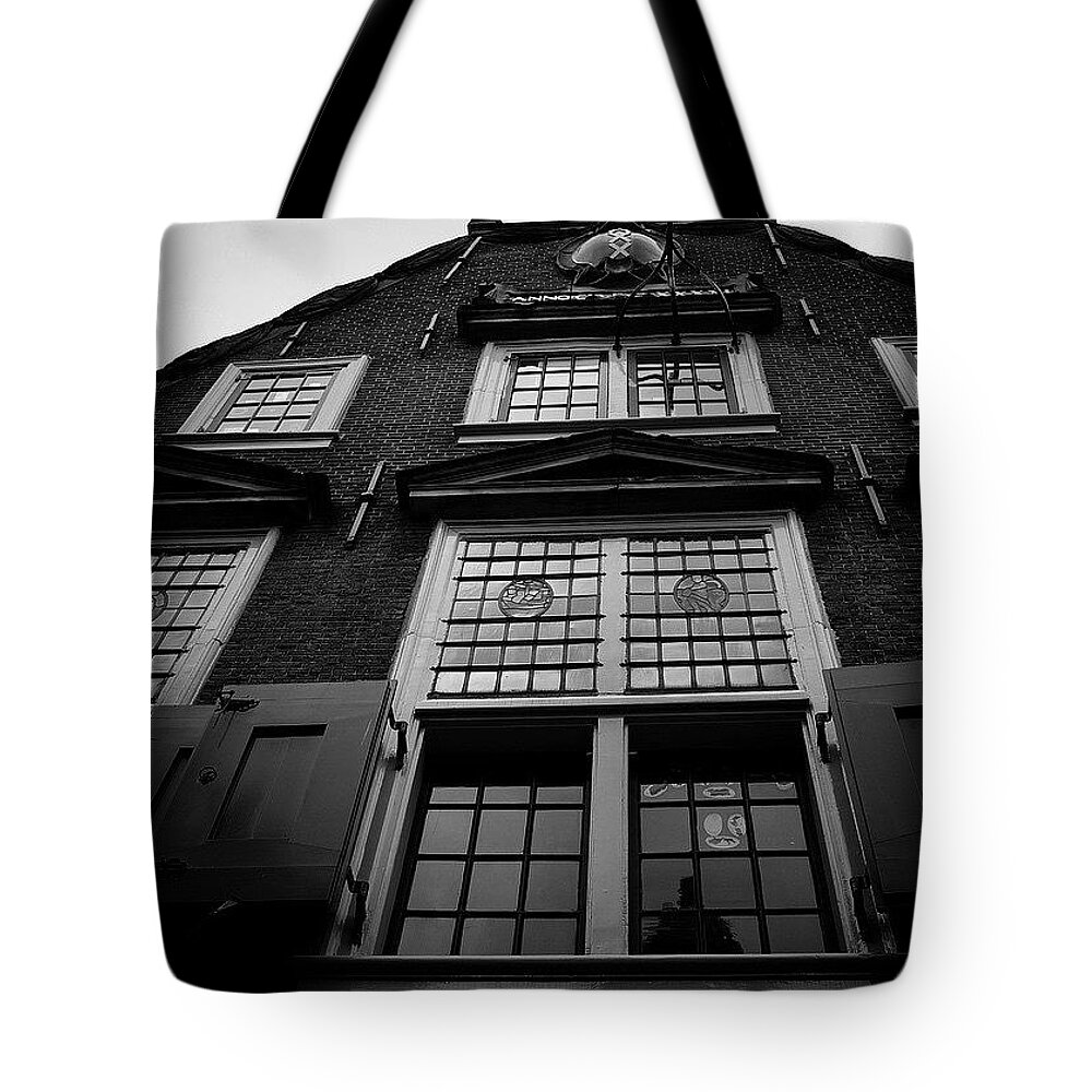  Tote Bag featuring the photograph The Figure In The Window by Aleck Cartwright