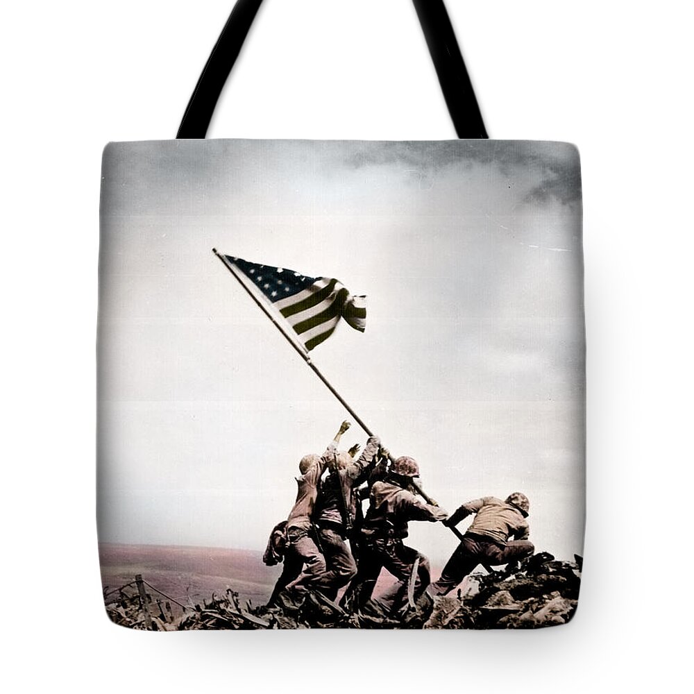 The Flag Raising Tote Bag featuring the photograph The flag raising at Iwo Jima World War II by Celestial Images