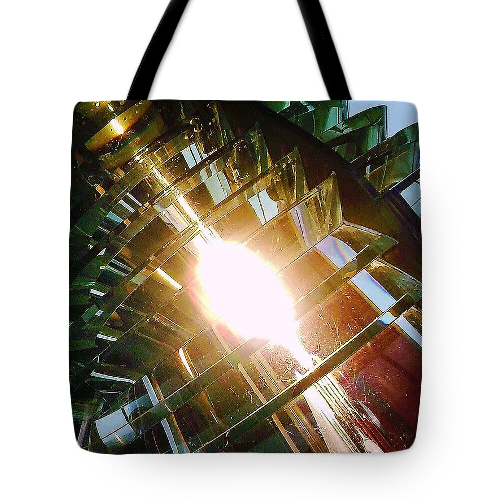 Lighthouse Tote Bag featuring the photograph The Light by Daniel Thompson
