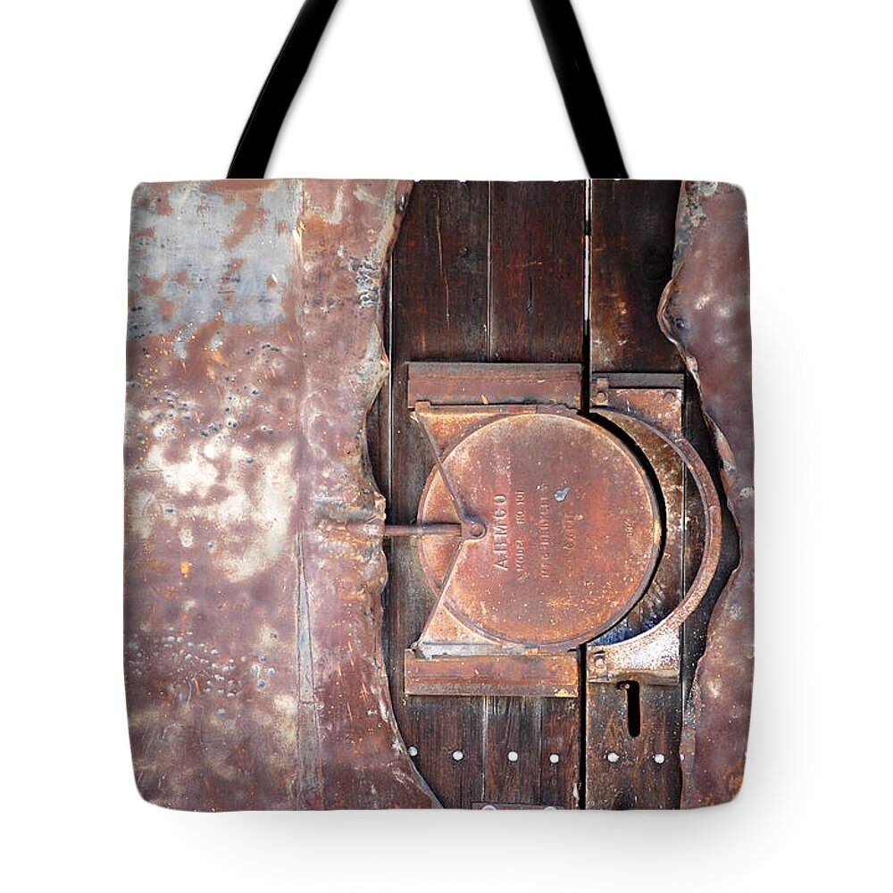 Lock Locking Mechanism Old Rusted Pounded Metals Metal Door Doors Amco Chico Ca California Art Dept Tote Bag featuring the photograph The Lockdown by Holly Blunkall