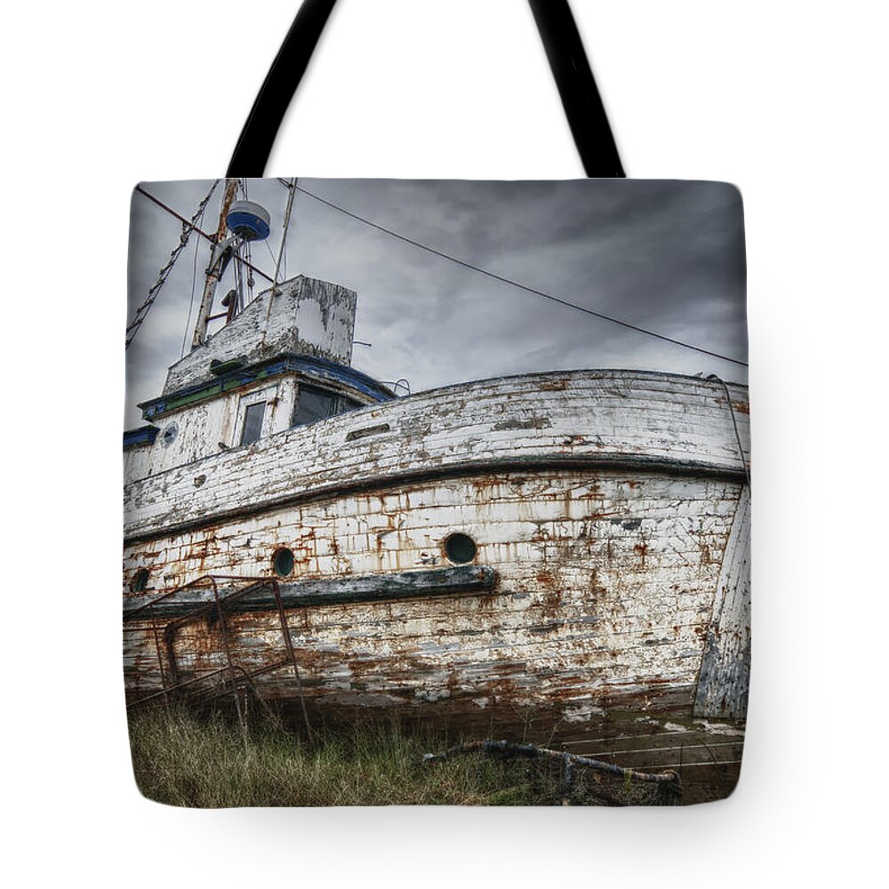 Boats Tote Bag featuring the photograph The Lost Fleet Weathering the Storm by Ghostwinds Photography