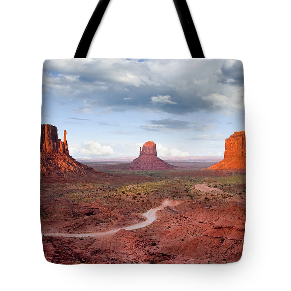 Arizona Tote Bag featuring the photograph The Mittens and Merrick Butte at Sunset by Jeff Goulden