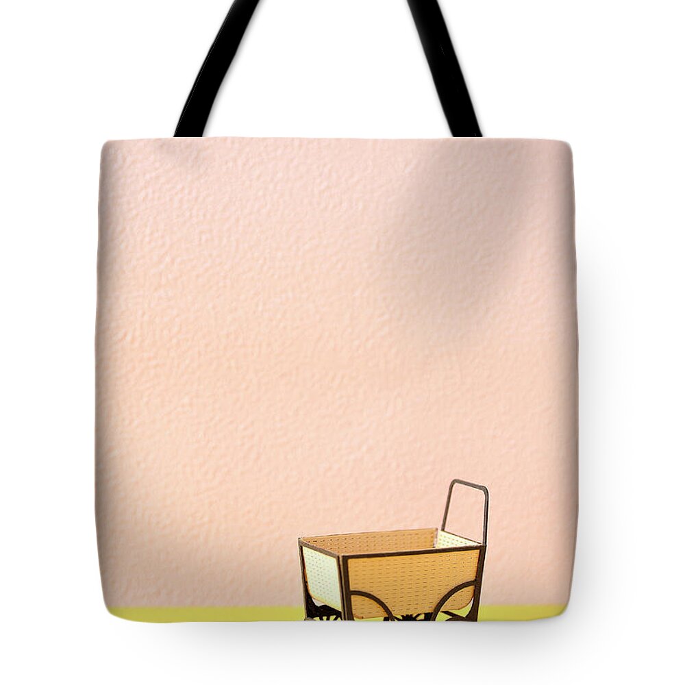 Baby Carriage Tote Bag featuring the photograph The Model Of The Baby Carriage Made Of by Yagi Studio