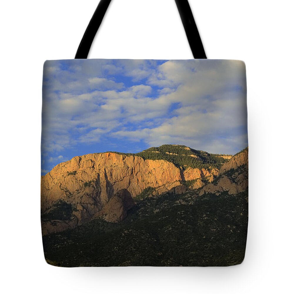 New Mexico Tote Bag featuring the photograph The Shield and The Needle of Sandia Crest by Alan Vance Ley