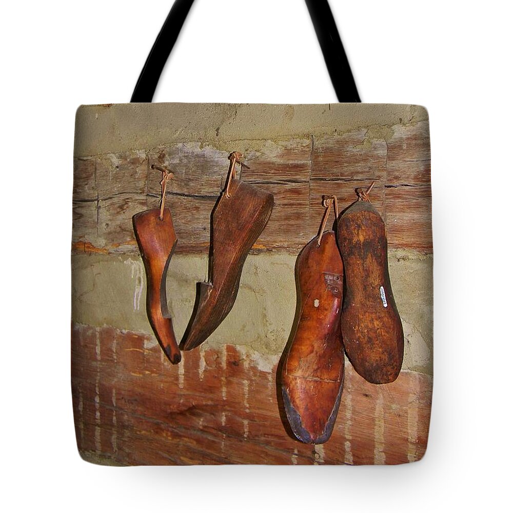 Rustic Tote Bag featuring the photograph The Shoemaker by Jean Goodwin Brooks