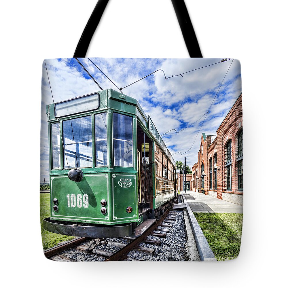 Colesville Tote Bag featuring the photograph The STIB 1069 streetcar at the National Capital Trolley Museum i by William Kuta
