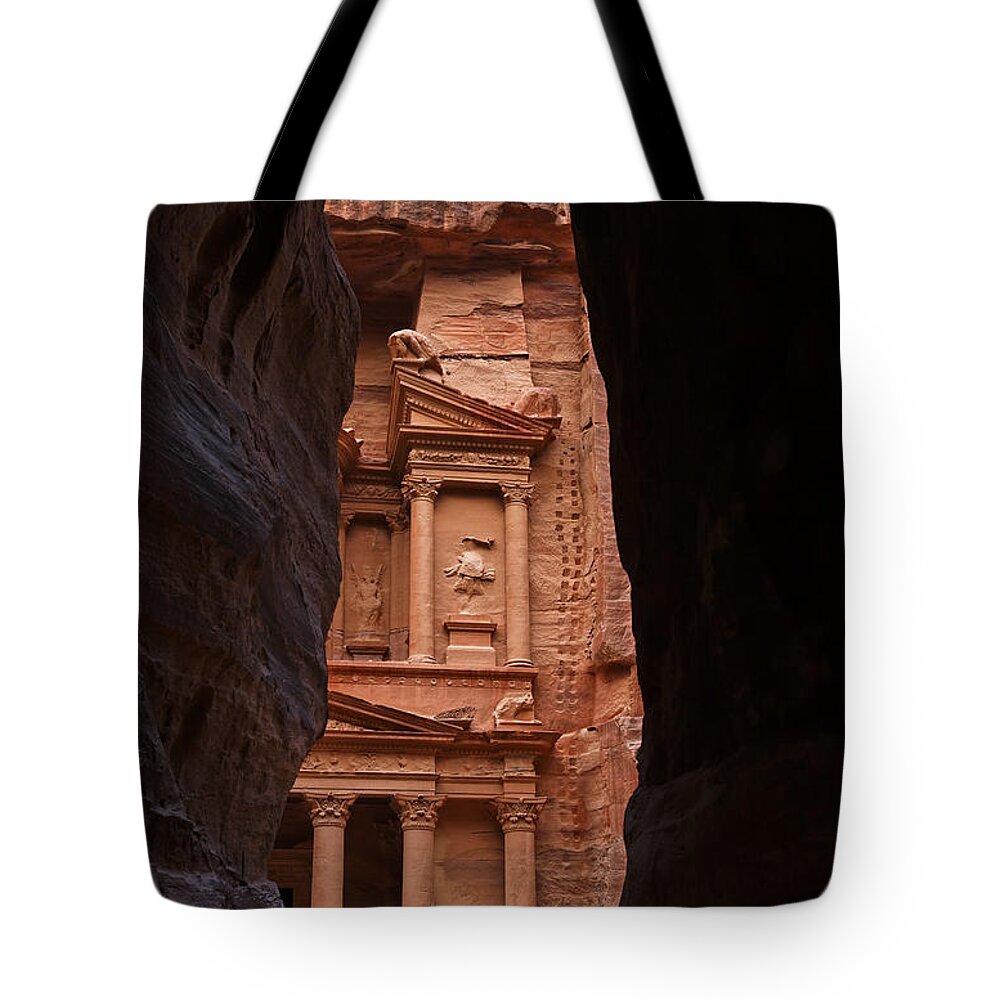 Petra Tote Bag featuring the photograph The Treasury seen from the Siq Petra Jordan by Robert Preston