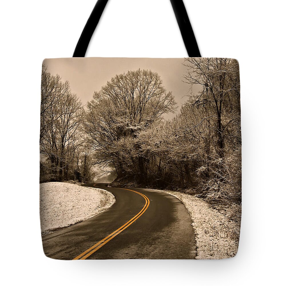 Images Tote Bag featuring the photograph The Twisted Road by Flees Photos