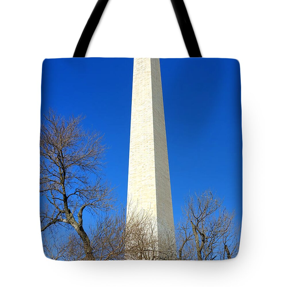 Washington Tote Bag featuring the photograph The Washington Monument and the Big Old Tree on the National Mall by Olivier Le Queinec