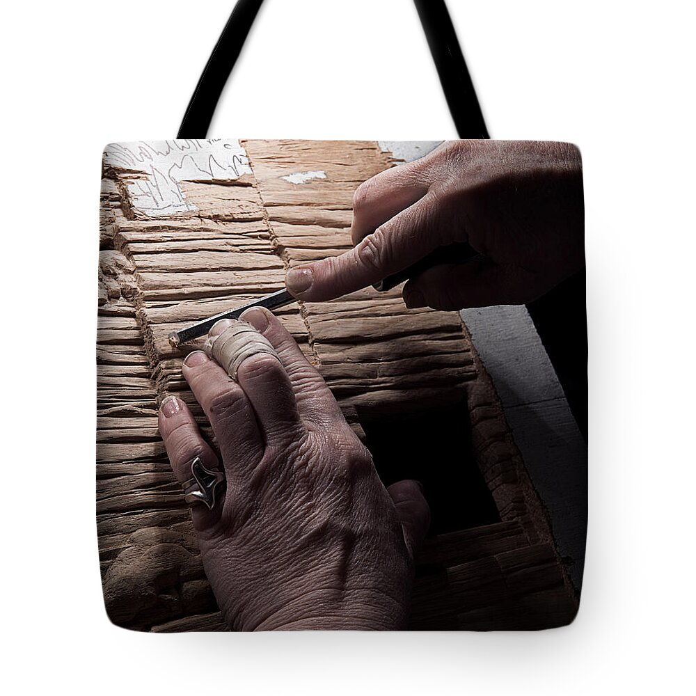 Wood Carver Tote Bag featuring the photograph The Wood Carver by Art Whitton