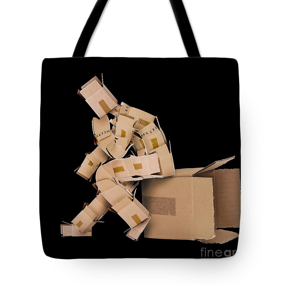  Thinking Tote Bag featuring the photograph Think outside the box concept by Simon Bratt