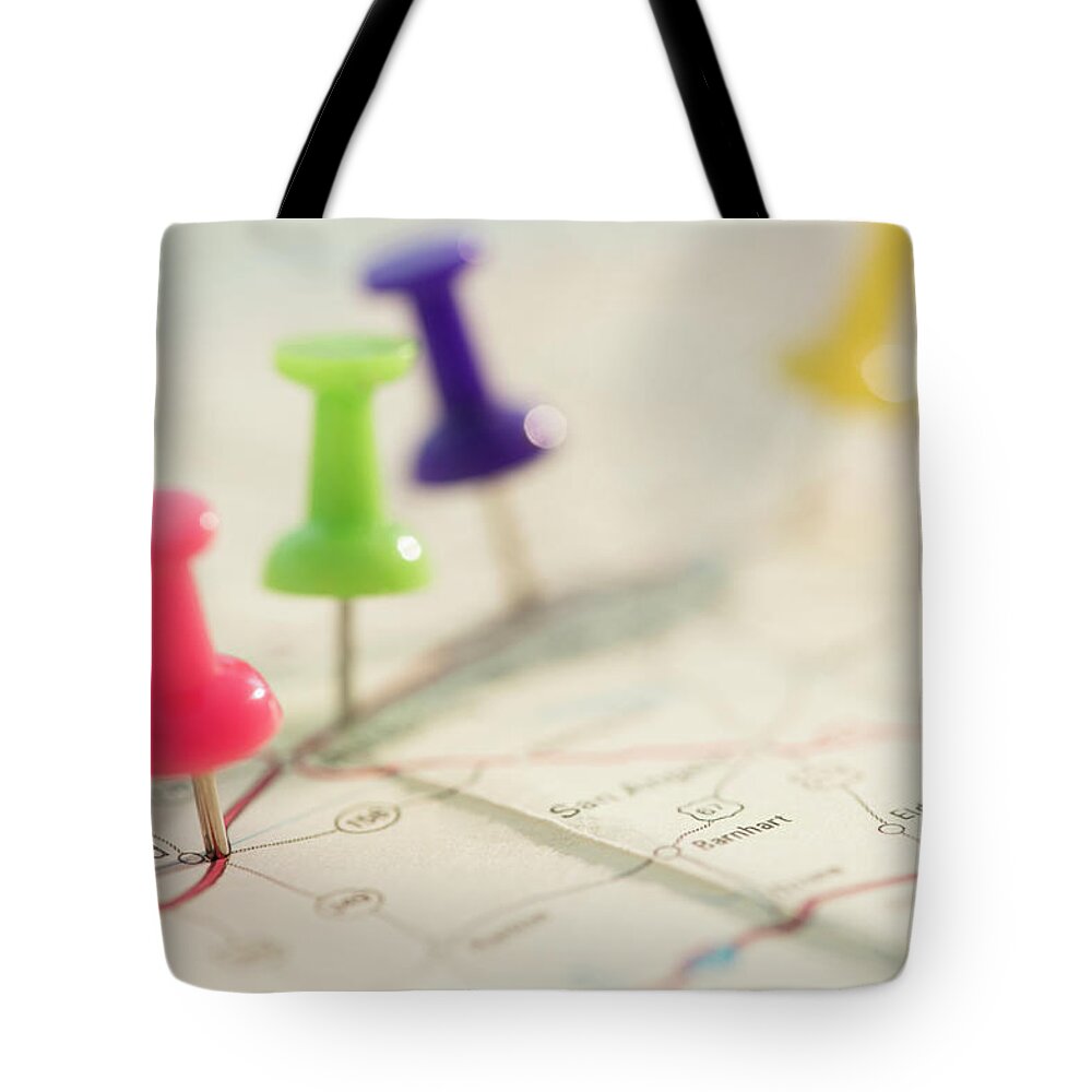 Adventure Tote Bag featuring the photograph Thumbtacks On Map by Jamie Grill