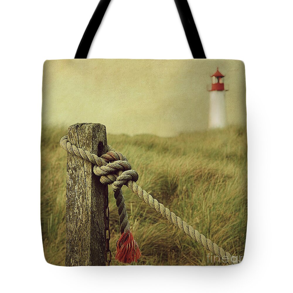 Lighthouse Tote Bag featuring the photograph To The Lighthouse by Hannes Cmarits