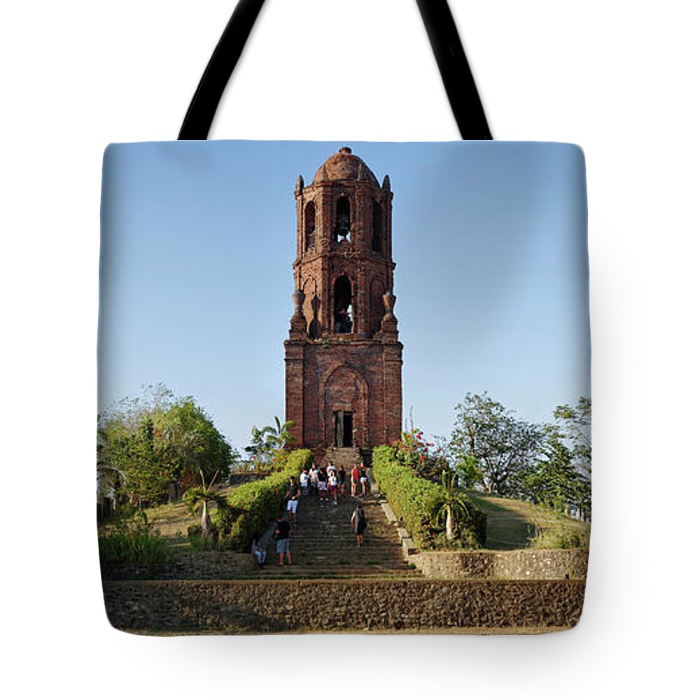 Photography Tote Bag featuring the photograph Tourists At Bantay Church Bell Tower by Panoramic Images