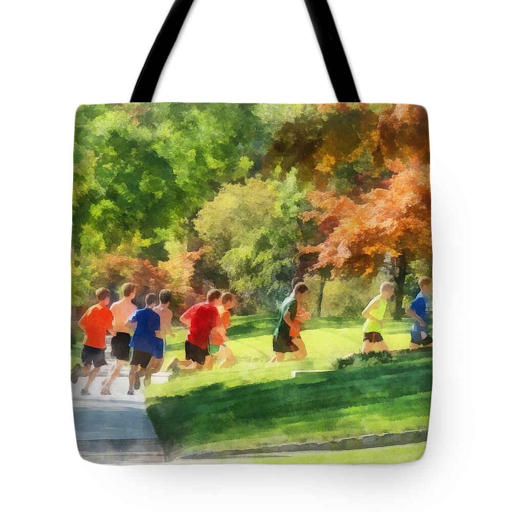 Track And Field Tote Bag featuring the photograph Track Team by Susan Savad